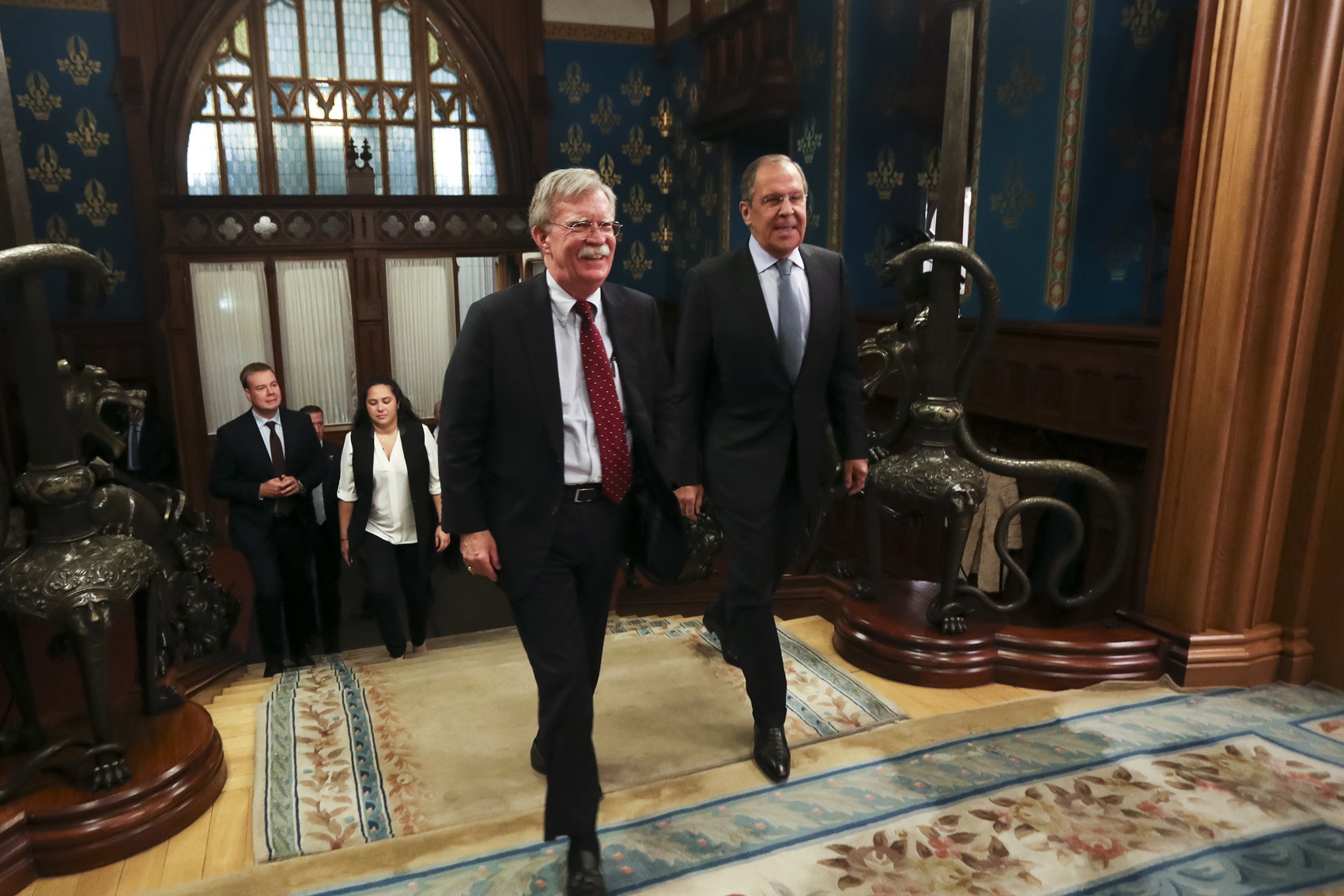 caption: U.S. National Security Adviser John Bolton, left, and Russian Foreign Minister Sergey Lavrov enter a hall for their talks in Moscow, Russia, Monday, Oct. 22, 2018. U.S. President Donald Trump's national security adviser has met with top Russian officials after Trump declared he intended to pull out of a 1987 nuclear weapons treaty. (Russian Foreign Ministry Press Service via AP)