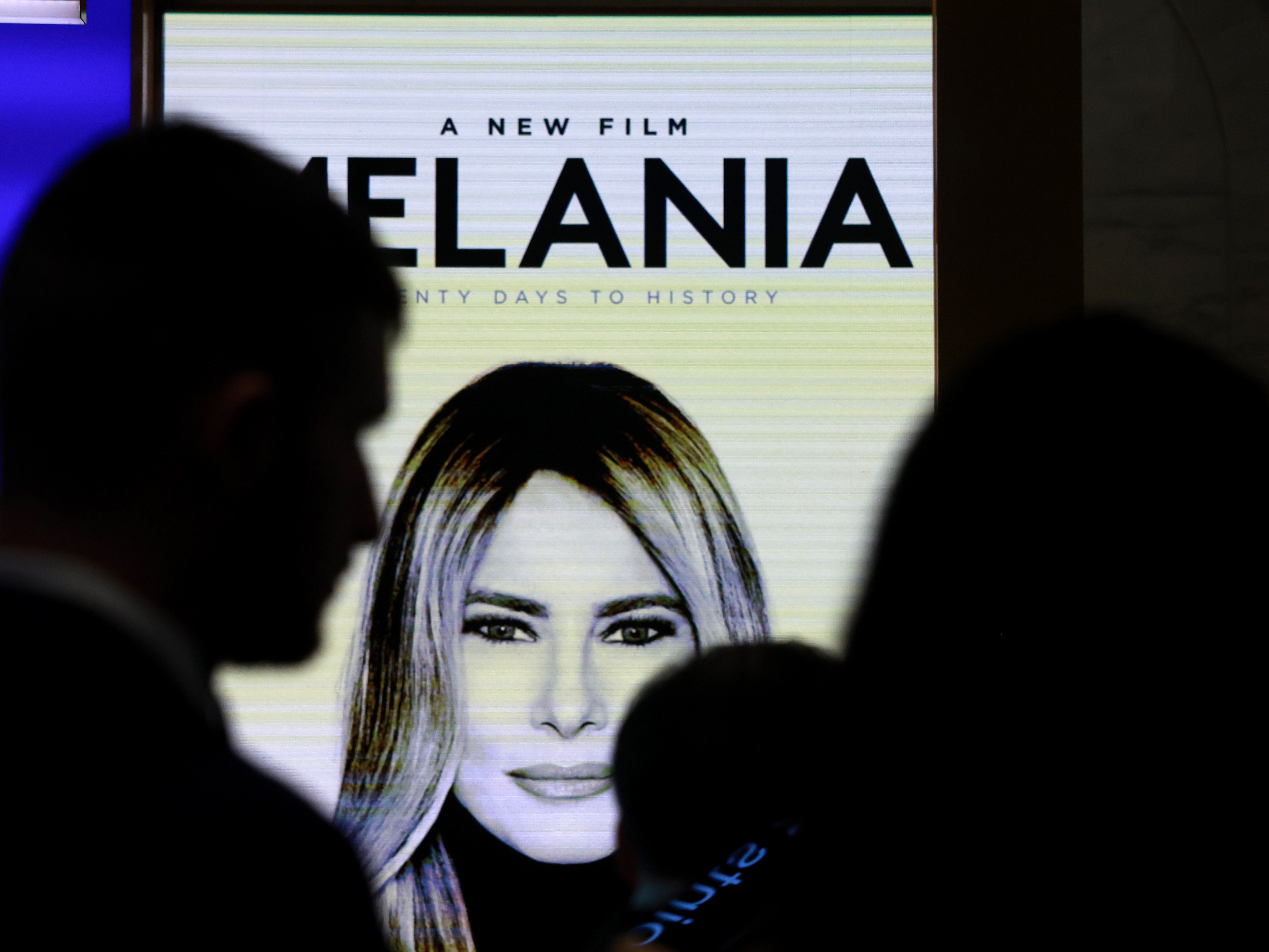 caption: Ads for the <em>Melania</em> movie at the New York Stock Exchange, where the first lady rang the bell last week.