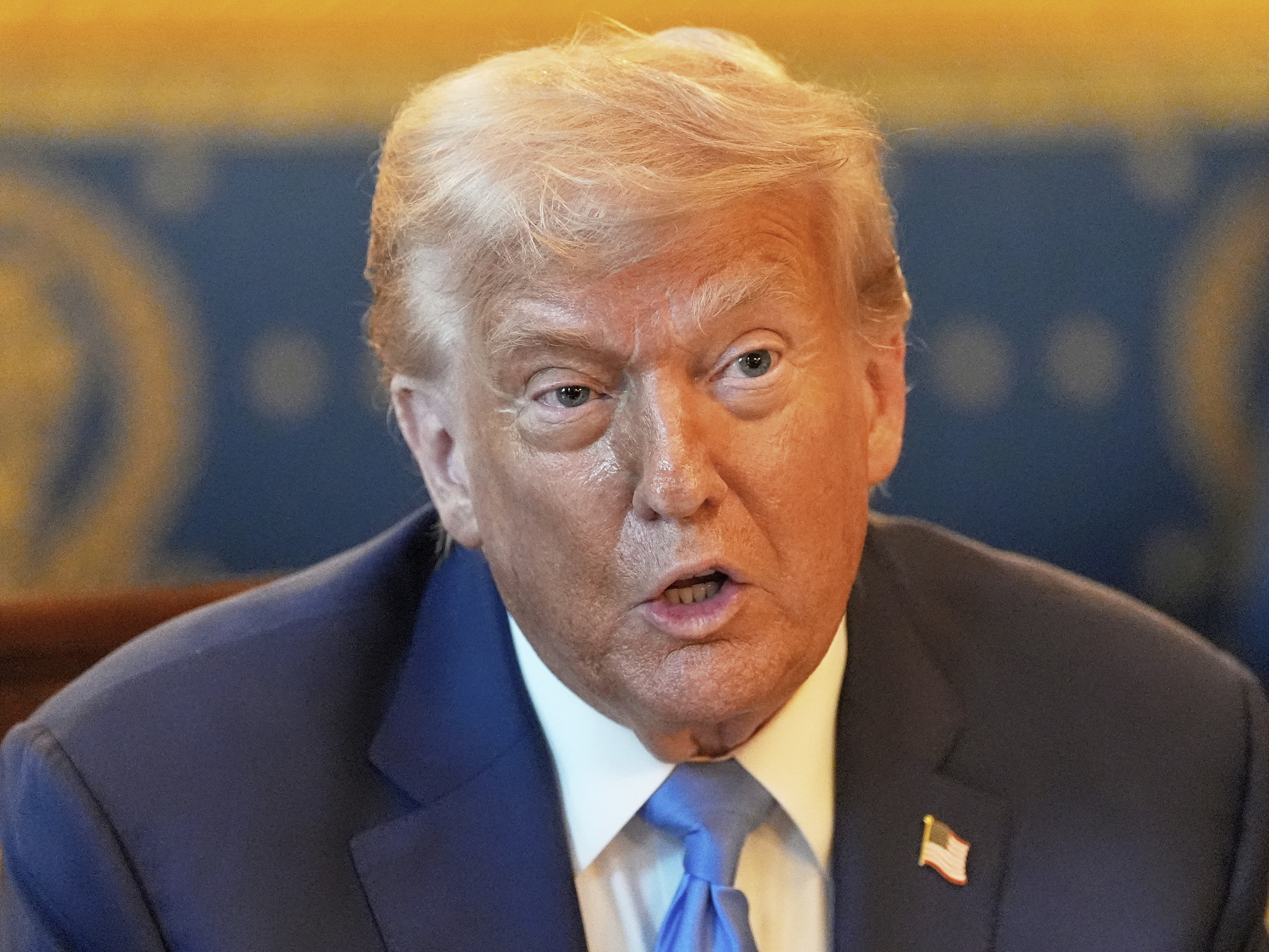 caption: President Trump speaks in the Blue Room of the White House on Monday.