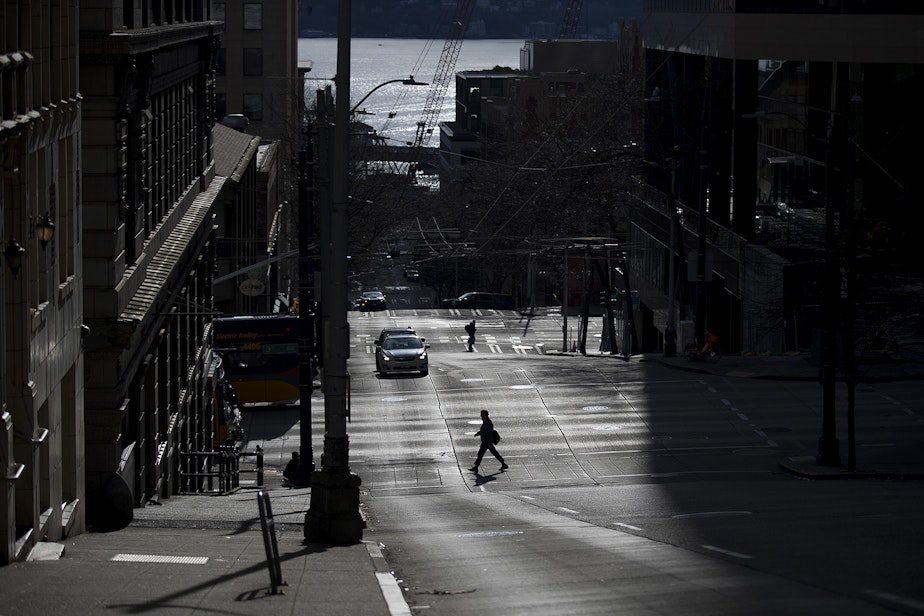 caption: A quiet downtown Seattle is shown on Wednesday, March 25, 2020, in Seattle.