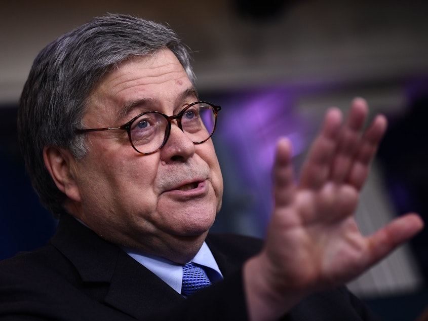 caption: Attorney General William Barr, pictured at a press briefing in March, has voiced opposition to the latest surveillance legislation after backing an earlier version.