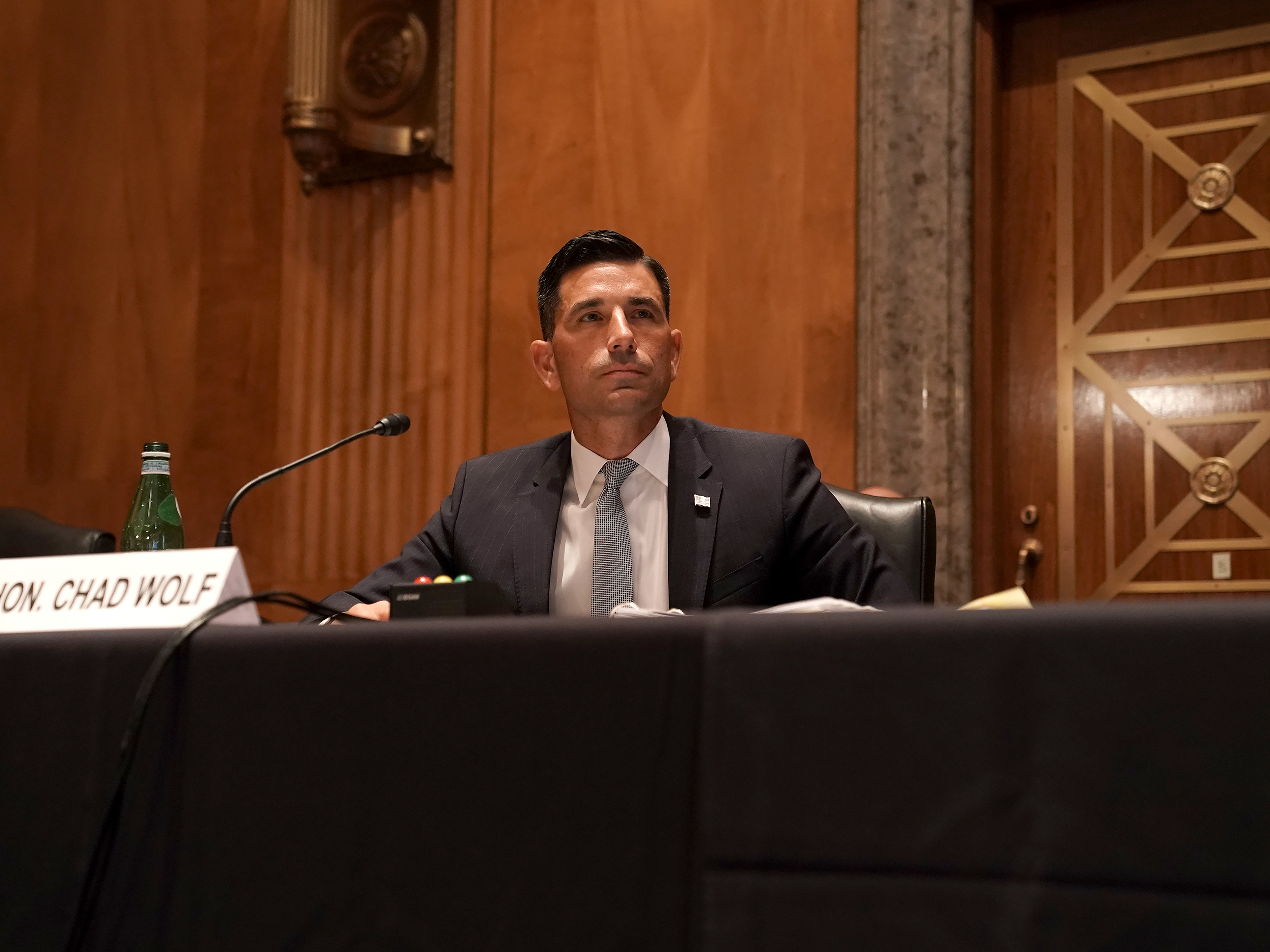 caption: Then-acting Homeland Security Secretary Chad Wolf testifies before Congress on Sept. 23, 2020, in Washington, D.C.