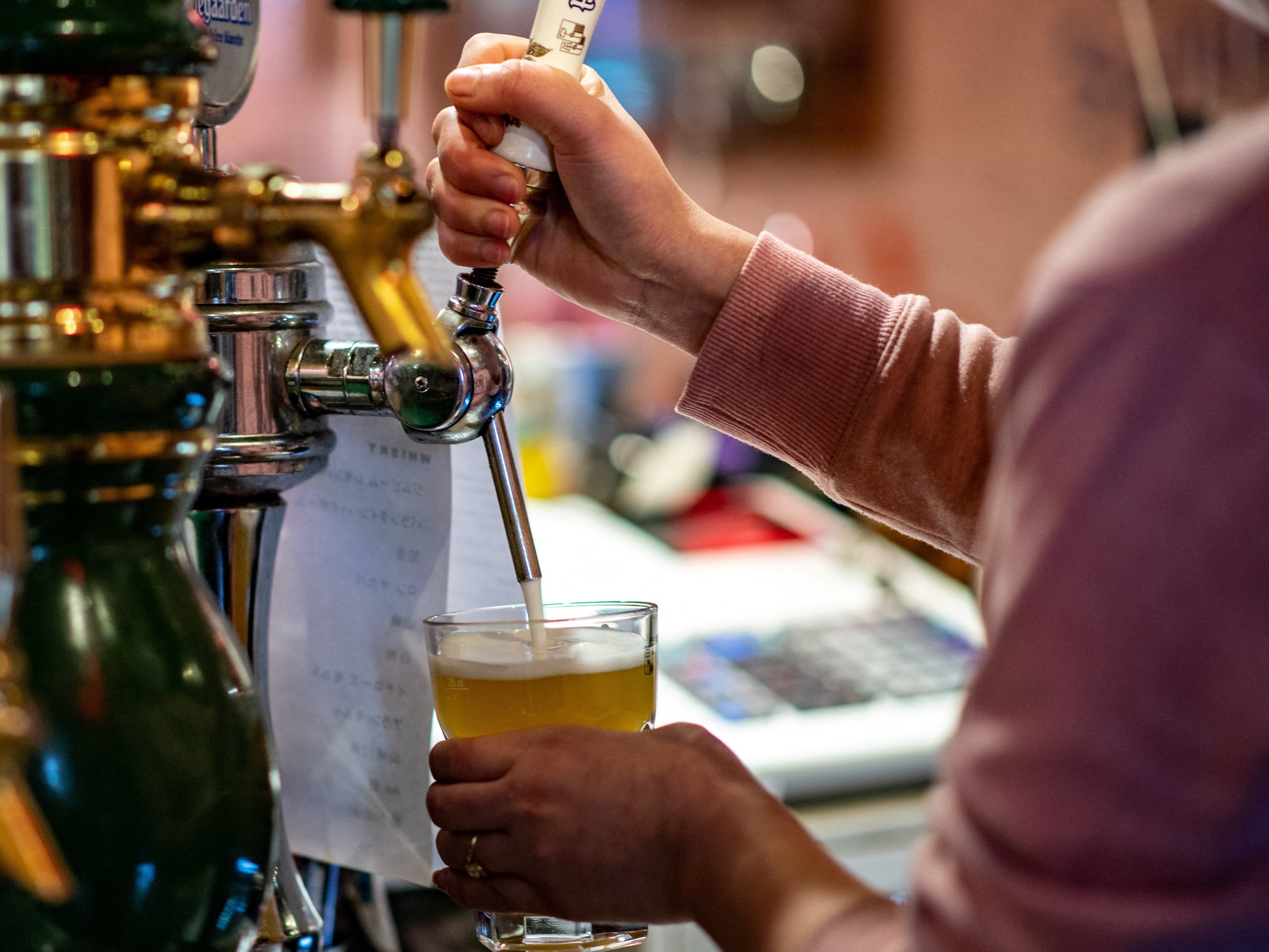 caption: The COVID-19 pandemic has hit Japan's alcohol industry hard, sharpening a long-running trend away from drinking. A new campaign sponsored by the National Tax Agency hopes to change that — but it's running into sharp criticism.