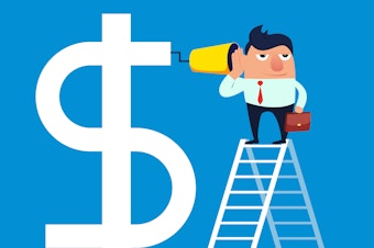 caption: Businessman climbs high with a ladder to communicate with the dollar