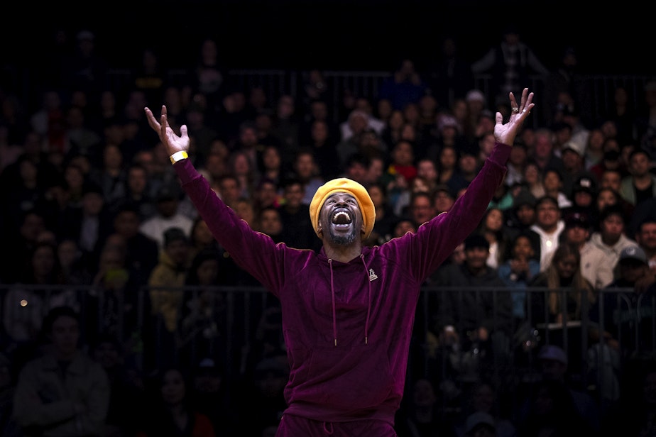 caption: Kamel "KMel" Howell, half of dance duo Boogie Brats, performs during Red Bull Lords of the Floor 2-on-2 breakdancing competition on Saturday, April 6, 2024, at WAMU Theater in Seattle. 