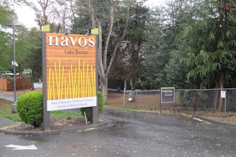 caption: Sign for Navos' Ruth Dykeman Children's Center in Burien, Wash.