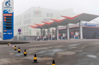 caption: A closed Gazprom gasoline station is shown in Almaty, Kazakhstan on Jan. 9, 2022.