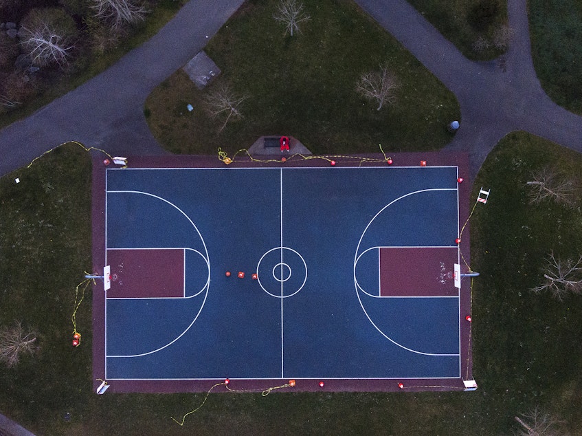 caption: A closed basketball court is shown on Thursday, April 9, 2020, at Cromwell Park in Shoreline.