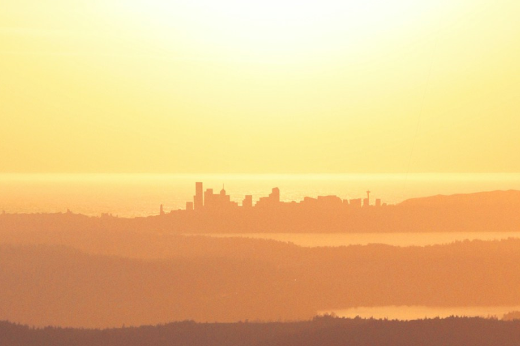 caption: A sunny day radiating above Seattle and Puget Sound. According to the National Weather Service, Western Washington will lean into above normal temperatures May through July 2024, with below average precipitation. 