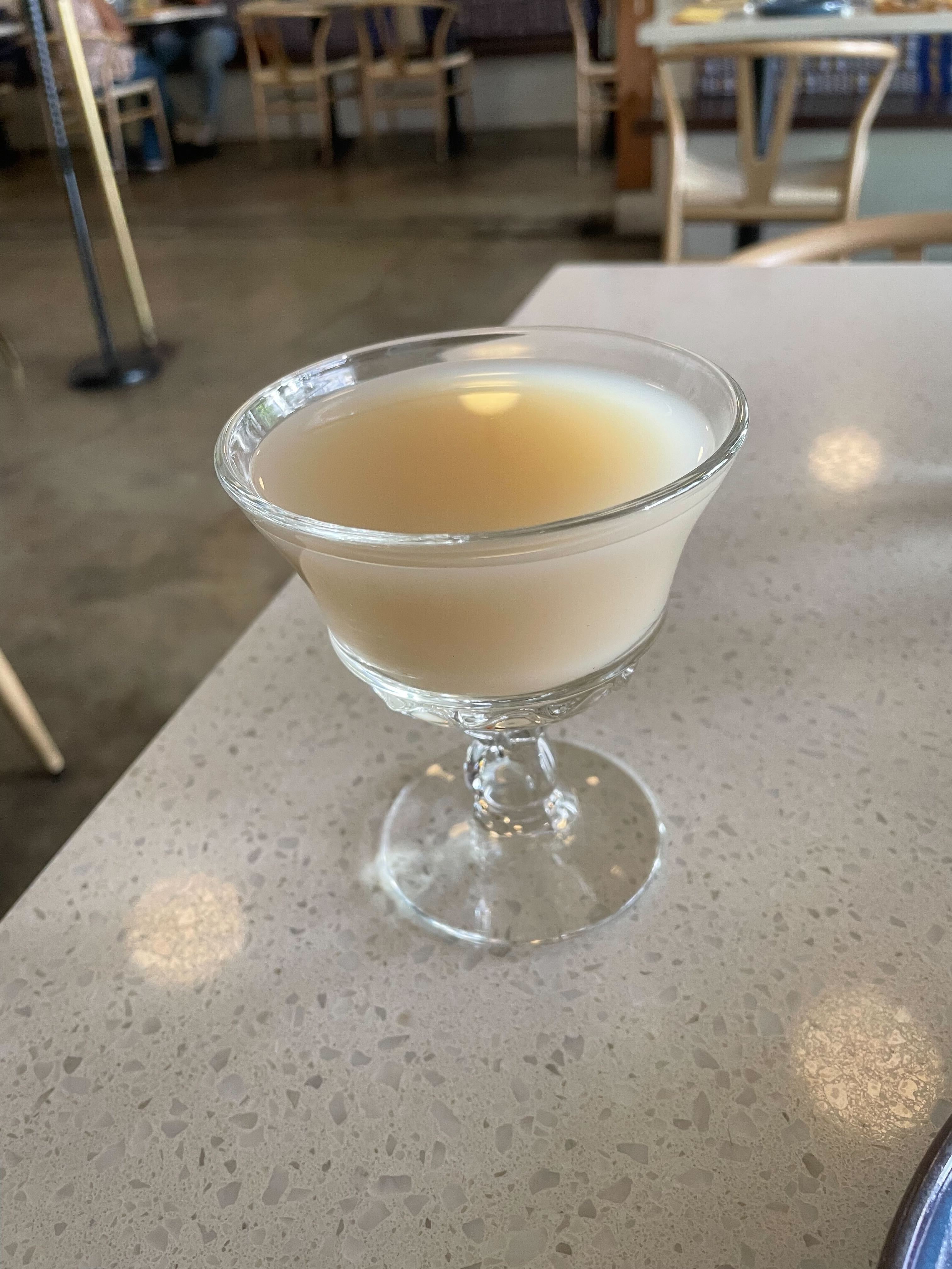 caption: Palm wine at Gold Coast Ghal Kitchen is juicy and buttery. 