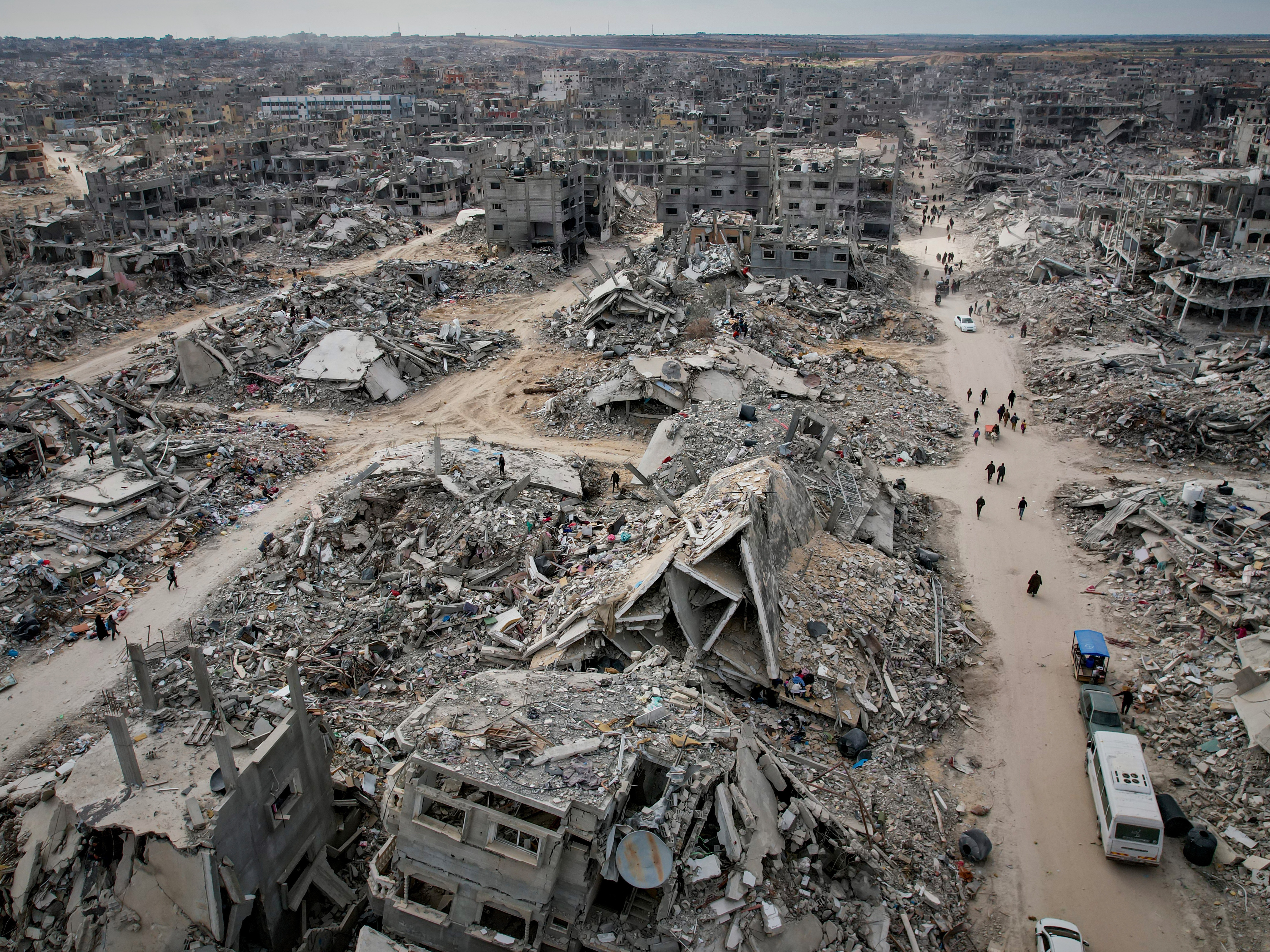 caption: Displaced people return to Rafah, Gaza Strip, on Jan. 20, 2025, a day after a ceasefire deal between Israel and Hamas went into effect.