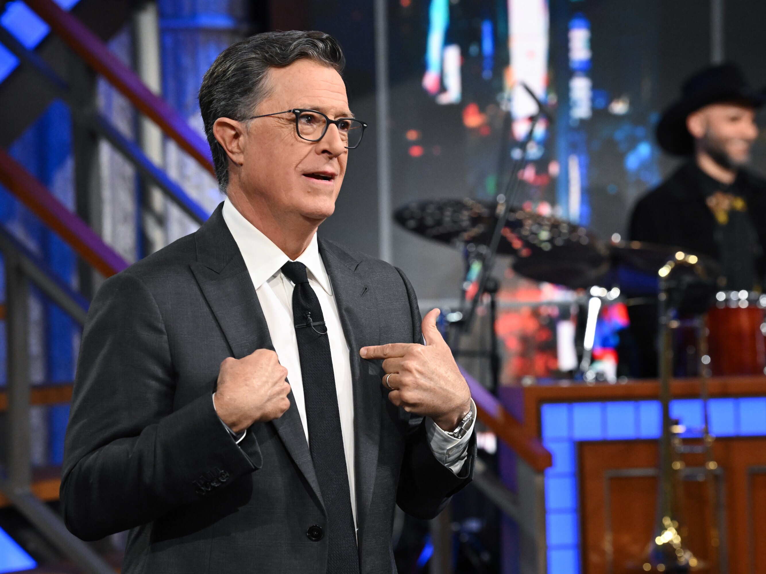 caption: Stephen Colbert during <em>The Late Show</em> on Monday, July 21.