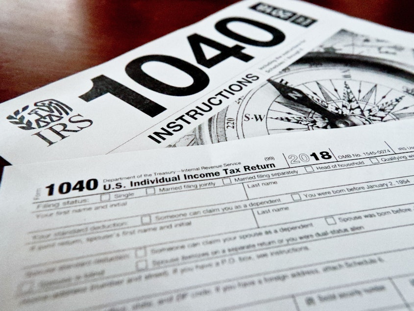 caption: Internal Revenue Service taxes forms are seen on Feb. 13, 2019.