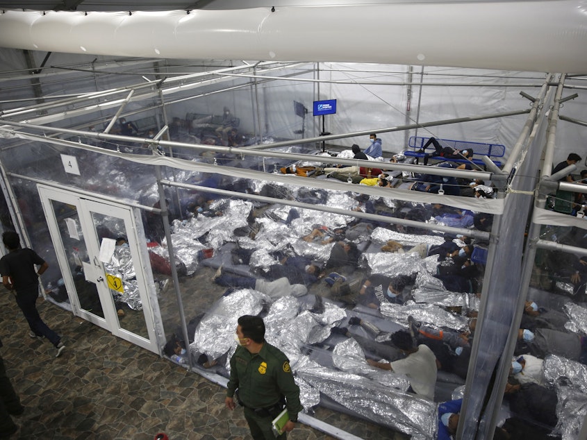 caption: The administration has struggled to house young migrants at Customs and Border Protection facilities like this one in Donna, Texas.