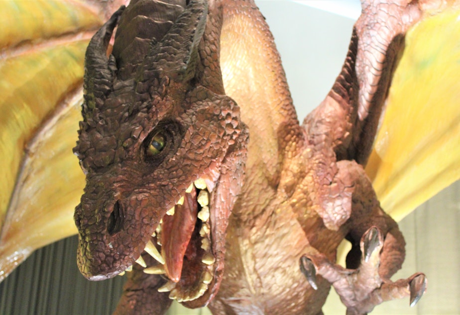 caption: A dragon hangs in the Renton, Wash., office of Wizards of the Coast, the maker of games including Dungeons and Dragons and Magic: The Gathering.