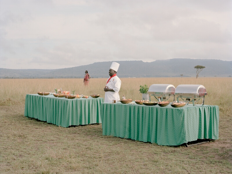 caption: A champagne breakfast is served as part of an "Africa experience" offered by a Kenya hotel.