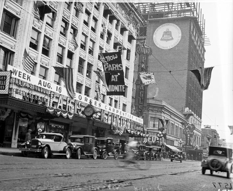 caption: Cars parked outside the Pantages Theatre in 1926, which was later torn down to make space for a parking lot that no longer exists.