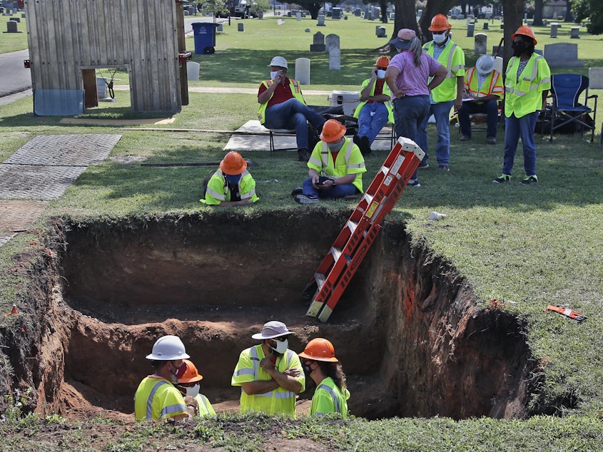 caption: A second excavation is planned in Tulsa, Okla., this week to unearth potential unmarked mass graves from a race massacre in 1921. In July,  researchers began excavation at Oaklawn Cemetery, shown here. They found no evidence of human remains at that particular excavation site.