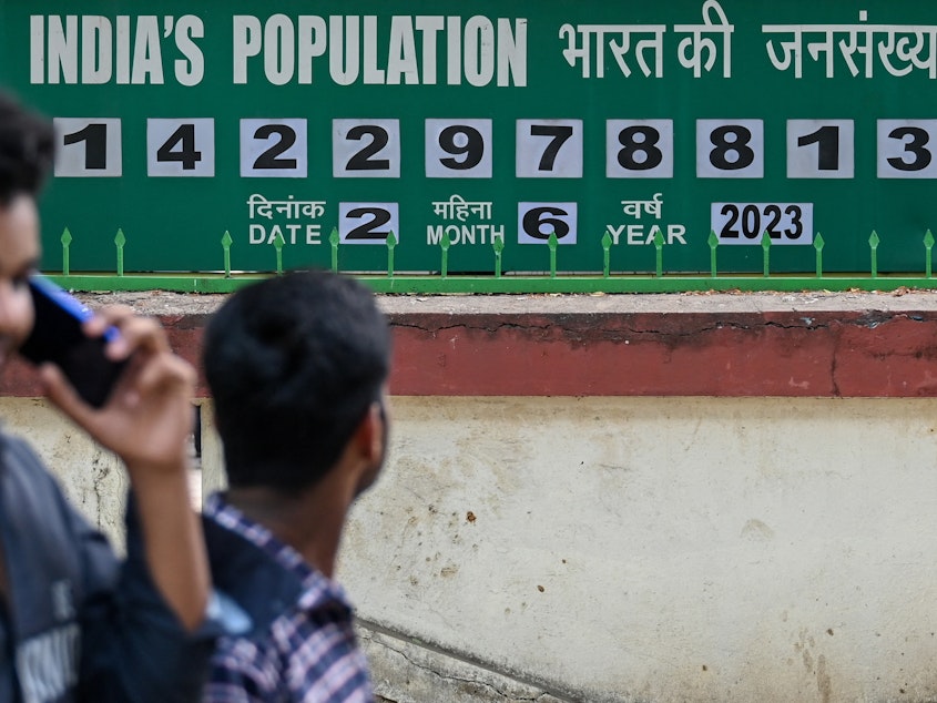 caption: India is number 1 in global population. This clock board outside the International Institute for Population Sciences in Mumbai keeps track of the numbers. The photo is from June 2, 2023.