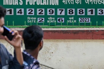 caption: India is number 1 in global population. This clock board outside the International Institute for Population Sciences in Mumbai keeps track of the numbers. The photo is from June 2, 2023.
