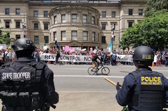 caption: <p>Multiple counter protests were underway in downtown <span class="link-complex-target"><a class="link-complex" href="https://twitter.com/search?q=%23Portland" target="_blank" rel="hashtag">Portland</a>&nbsp;Sunday, June&nbsp;4, 2017</span>, including this group demanding rent control.</p>