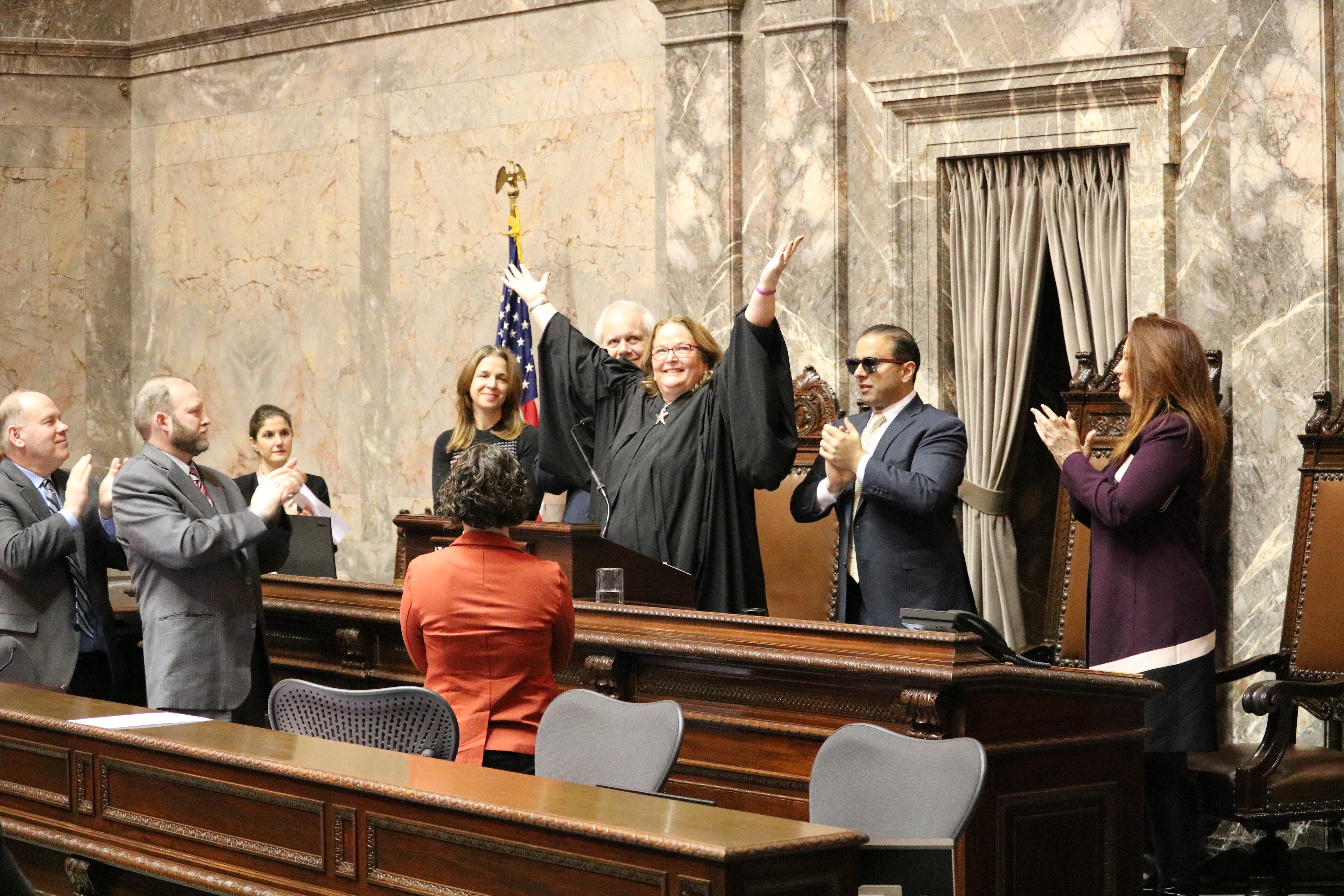 caption: Chief Justice Mary Fairhurst addresses a joint session of the Washington Legislature. Fairhurst, who is battling colon cancer, has announced she will retire from the court in January.