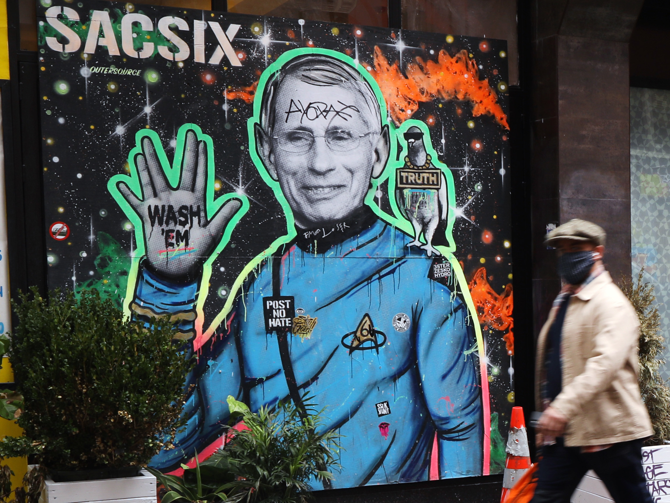 caption: Dr. Anthony Fauci, here depicted in a mural in New York City, is "a proud son of Brooklyn" who is helping the country get through the COVID-19 pandemic, Brooklyn Borough President Eric Adams said.