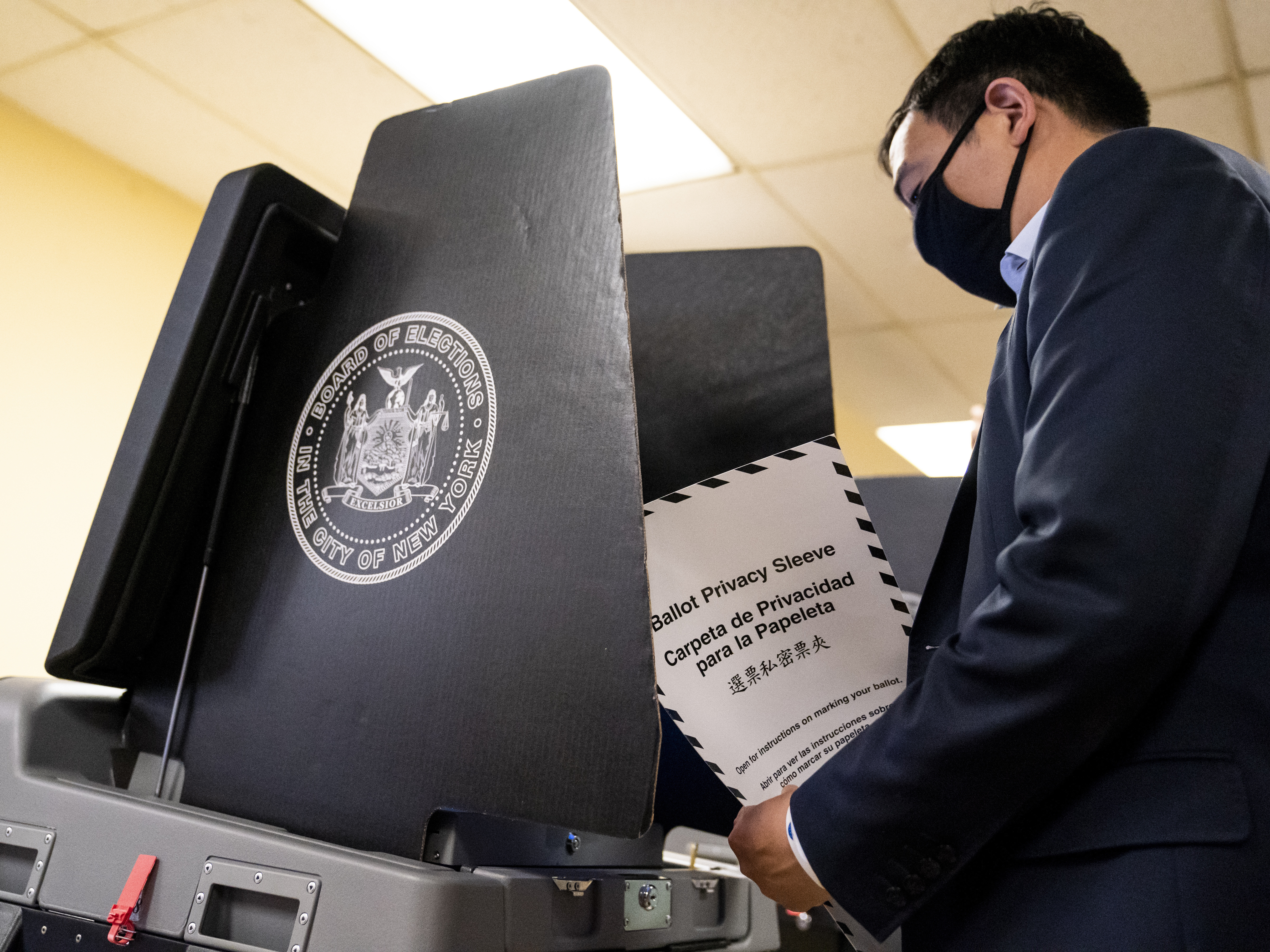 caption: New York City Democratic mayoral candidate Andrew Yang prepares to cast his ballot at an early voting site last week. The election provides America's biggest-yet test for ranked-choice voting.