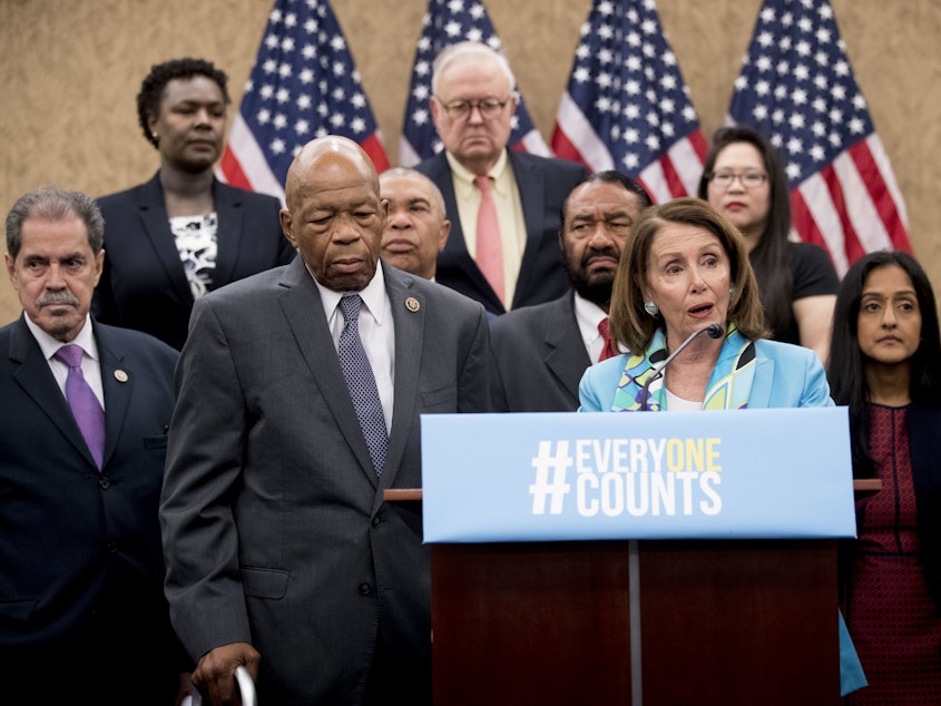 caption: Nancy Pelosi of California (third from right), now House speaker, joins fellow Democrats, including Reps. José Serrano of New York and Elijah Cummings of Maryland, as well as other census advocates at a May 2018 press conference in Washington, D.C., about the new citizenship question on the 2020 census.