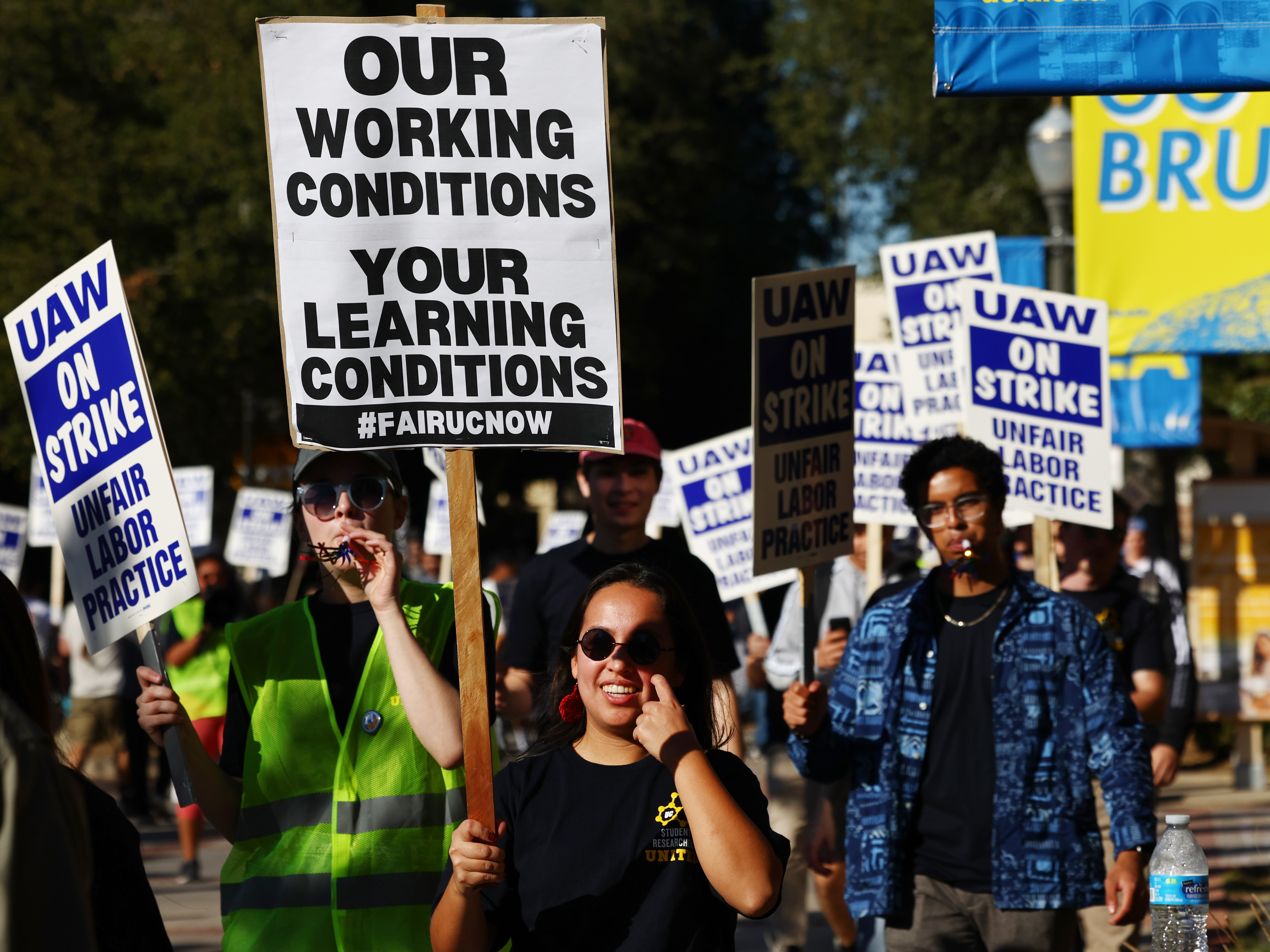 caption: Union academic workers and supporters march and picket at the UCLA campus amid a statewide strike by nearly 48,000 University of California unionized workers on Nov. 15, 2022, in Los Angeles.