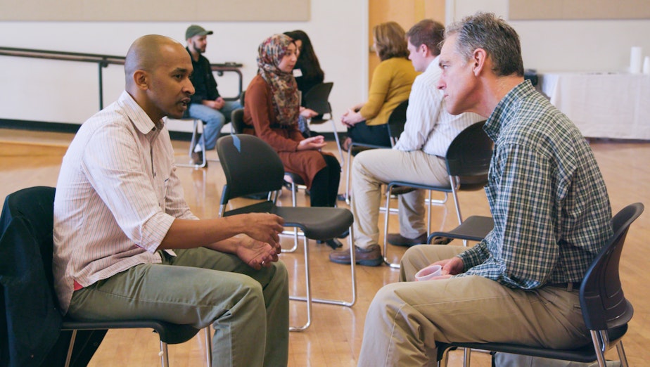 caption: Ask a Muslim participants at the New Holly Gathering Hall on April 2, 2017.