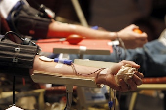 caption: An expected change in FDA policy would make it easier for men who have sex with men to donate blood.