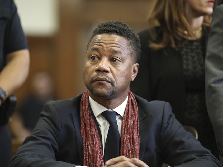 caption: Actor Cuba Gooding Jr. appears in a New York courtroom in 2020. He pleaded guilty Wednesday to one count of forcible touching.
