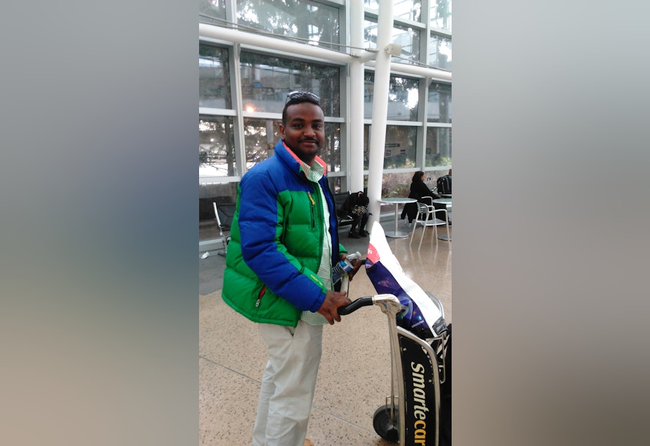 caption: Muwafag Gasim, of Sudan and Seattle, was detained for five hours upon return from a family visit. Gasim is a construction engineer in Seattle.