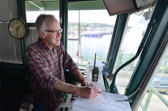 caption: Bridge tender David Leask has worked in the control tower at the Ballard Bridge for 18 years.