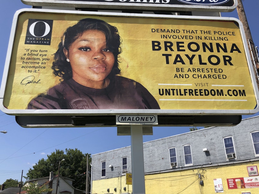 caption: A billboard with a photo of Breonna Taylor, sponsored by <em>O, The Oprah Magazine</em>, is on display on Friday in Louisville, Ky. It's one of 26 billboards going up across the city demanding arrests in her shooting death.