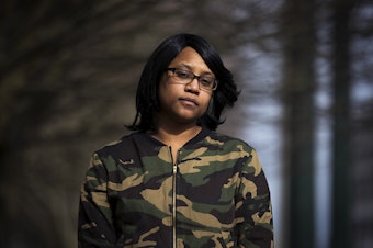 caption: Marquita Jackson stands for a portrait on Sunday, February 28, 2021, near her home in Tacoma.
