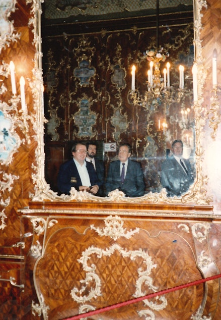 caption: “This is Italy,” said former Secret Service Agent Mike Endicott, looking at this photograph. “They’re sitting at the table and this is a picture of them in the mirror.” Endicott couldn’t remember the names of the men standing next to former President Richard Nixon. 