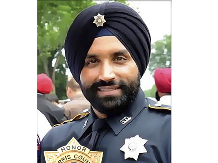 caption: Harris County Sheriff's Deputy Sandeep Dhaliwal was shot and killed after making a traffic stop on Friday near Houston. The suspected gunman was charged with capital murder in the slaying.