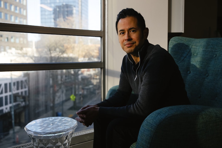 caption: Author Juan Carlos Reyes is portrayed on Friday, Jan. 24, 2025, at KUOW in Seattle.