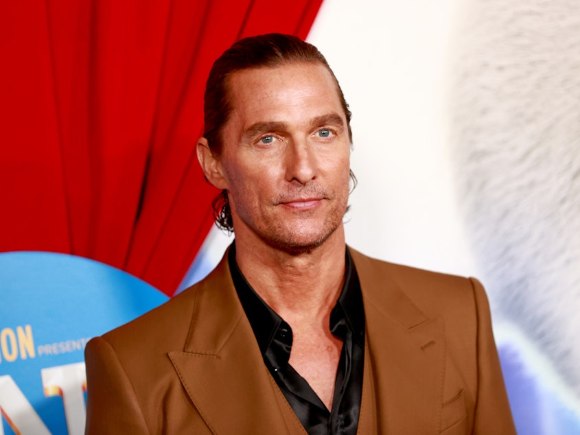caption: Matthew McConaughey attends a movie premiere on Dec. 12, 2021, in Los Angeles.
