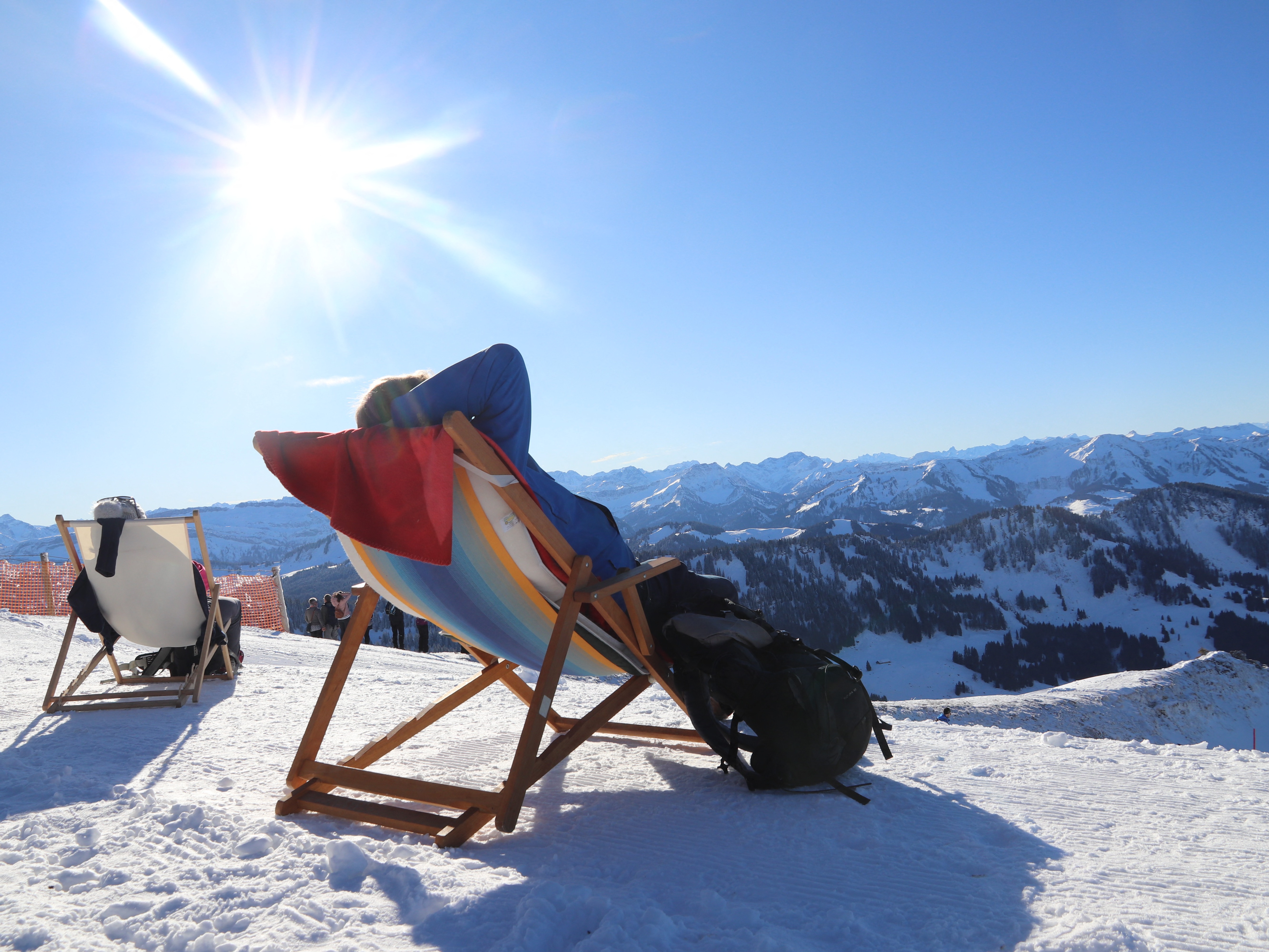 caption: People soak up the sun on deck chairs in the Allgäu region of southern Germany in 2020. Saturday is the winter solstice, the shortest day of the year in the Northern Hemisphere.