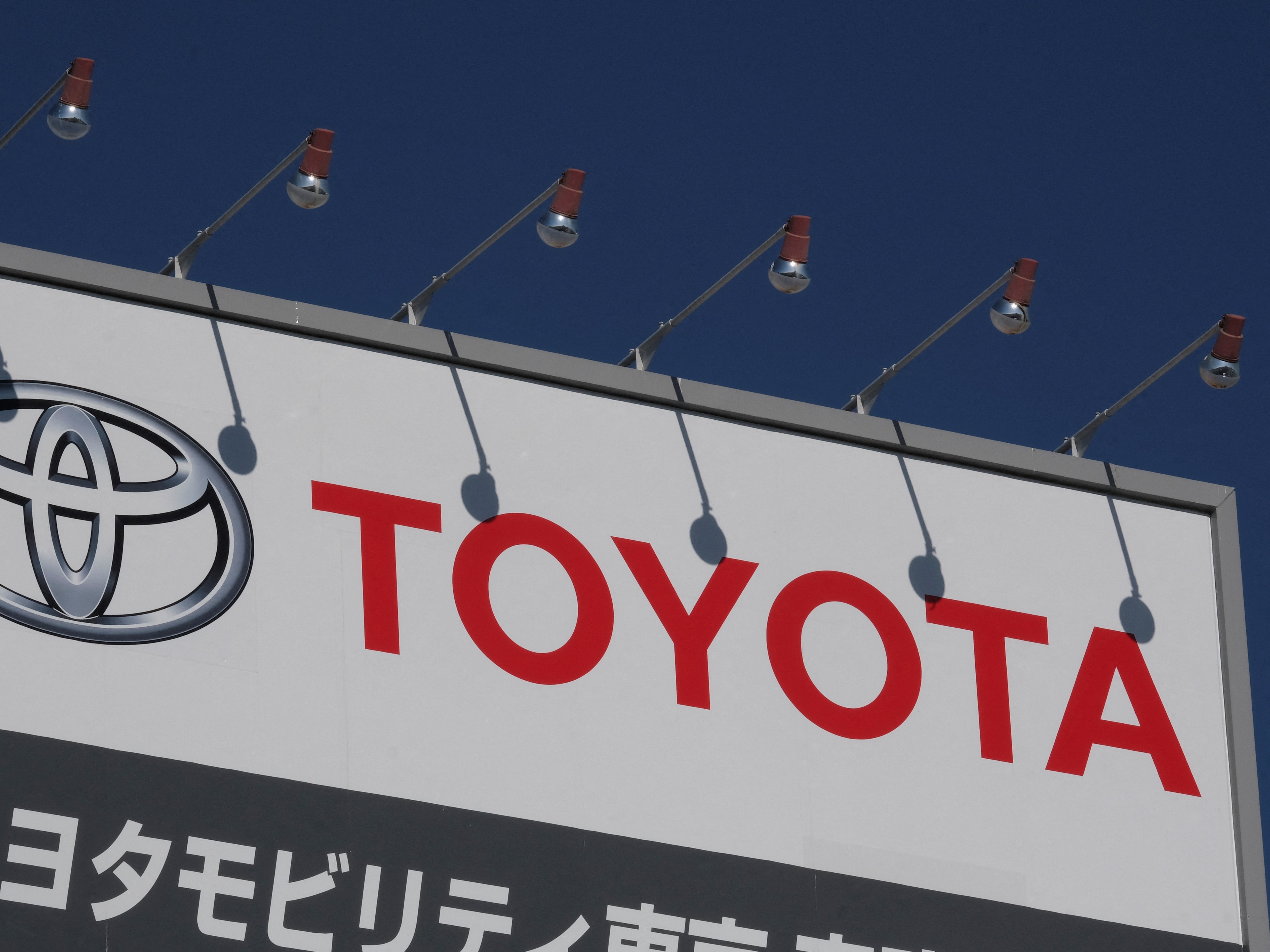 The logo of Japan's Toyota Motor is displayed at a dealership in Tokyo on February 9, 2022.