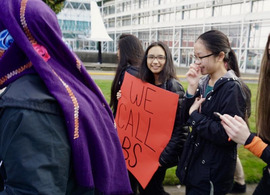 caption: On the one month anniversary of the Parkland shooting, students at Raisbeck Aviation High School in Tukwila held a walk out. A student's sign quoted the words of Parkland student Emma Gonzalez who spoke out against current gun policies.
