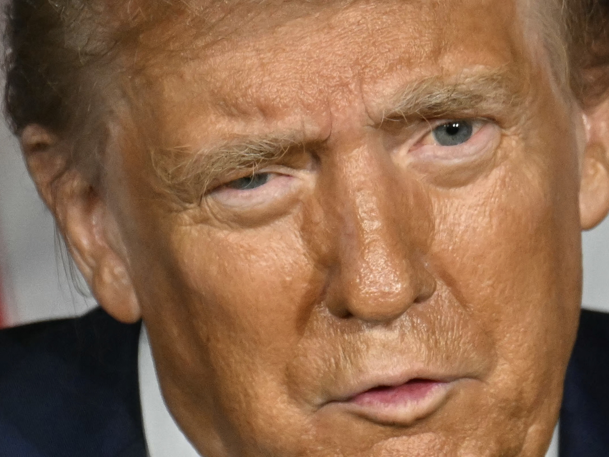 caption: Donald Trump speaks during a campaign event on Tuesday.