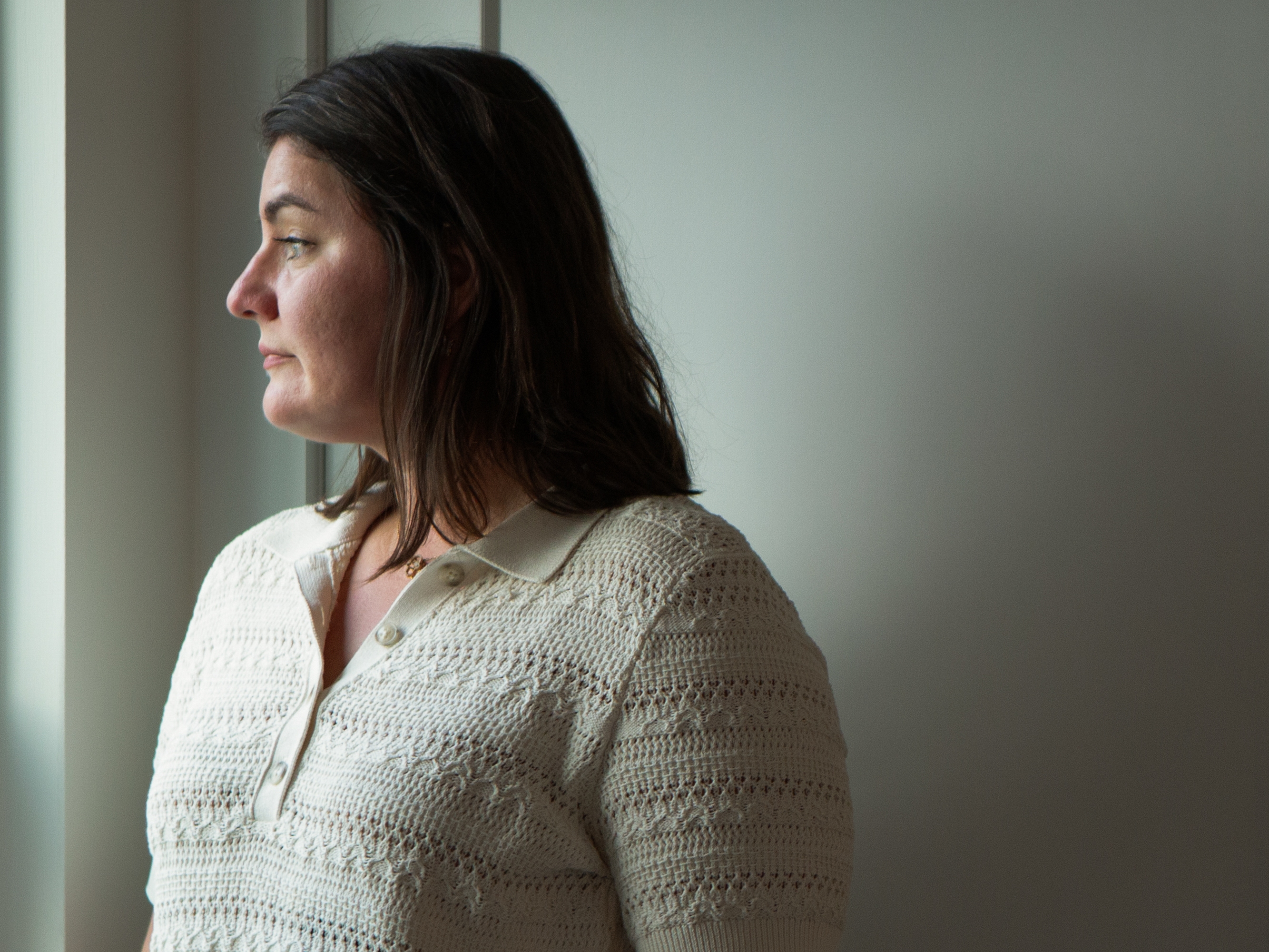 caption: Karina Ambartsoumian-Clough at home in New Jersey on July 26. She was born in what was then Soviet Ukraine and fled to the U.S. with her family in 1996. They sought — and were denied — political asylum and discovered they were not recognized as citizens of any country.