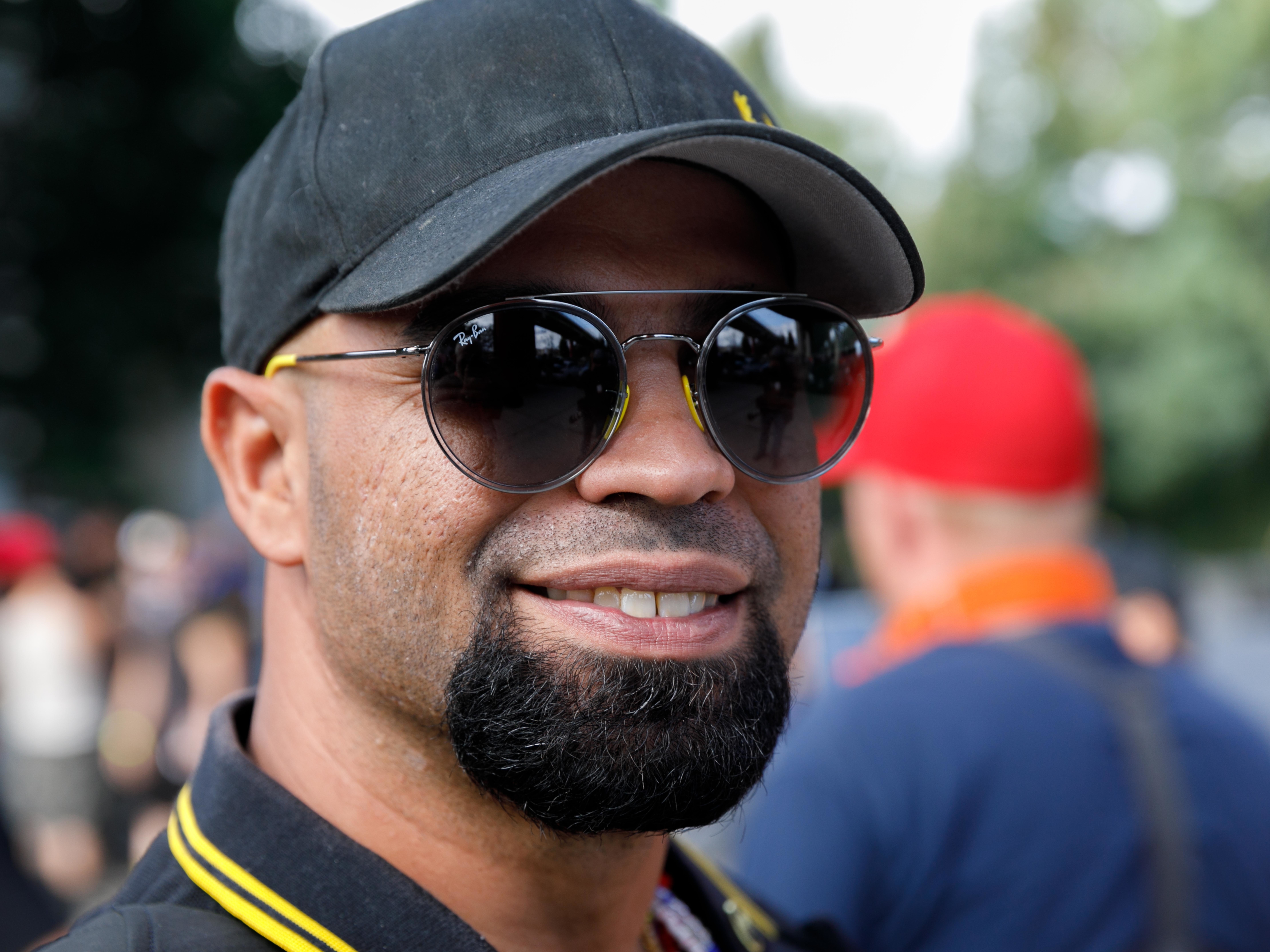 caption: The Justice Department says that as the leader and creator of a special chapter of the Proud Boys known as the Ministry of Self Defense, Enrique Tarrio "led the advance planning and remained in contact with other members of the Proud Boys during their breach of the Capitol."