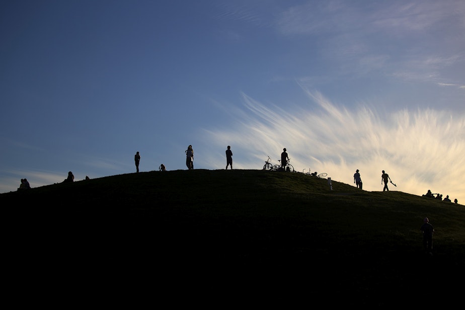 caption: People gather on Wednesday, May 27, 2020, at Gas Works Park in Seattle. 