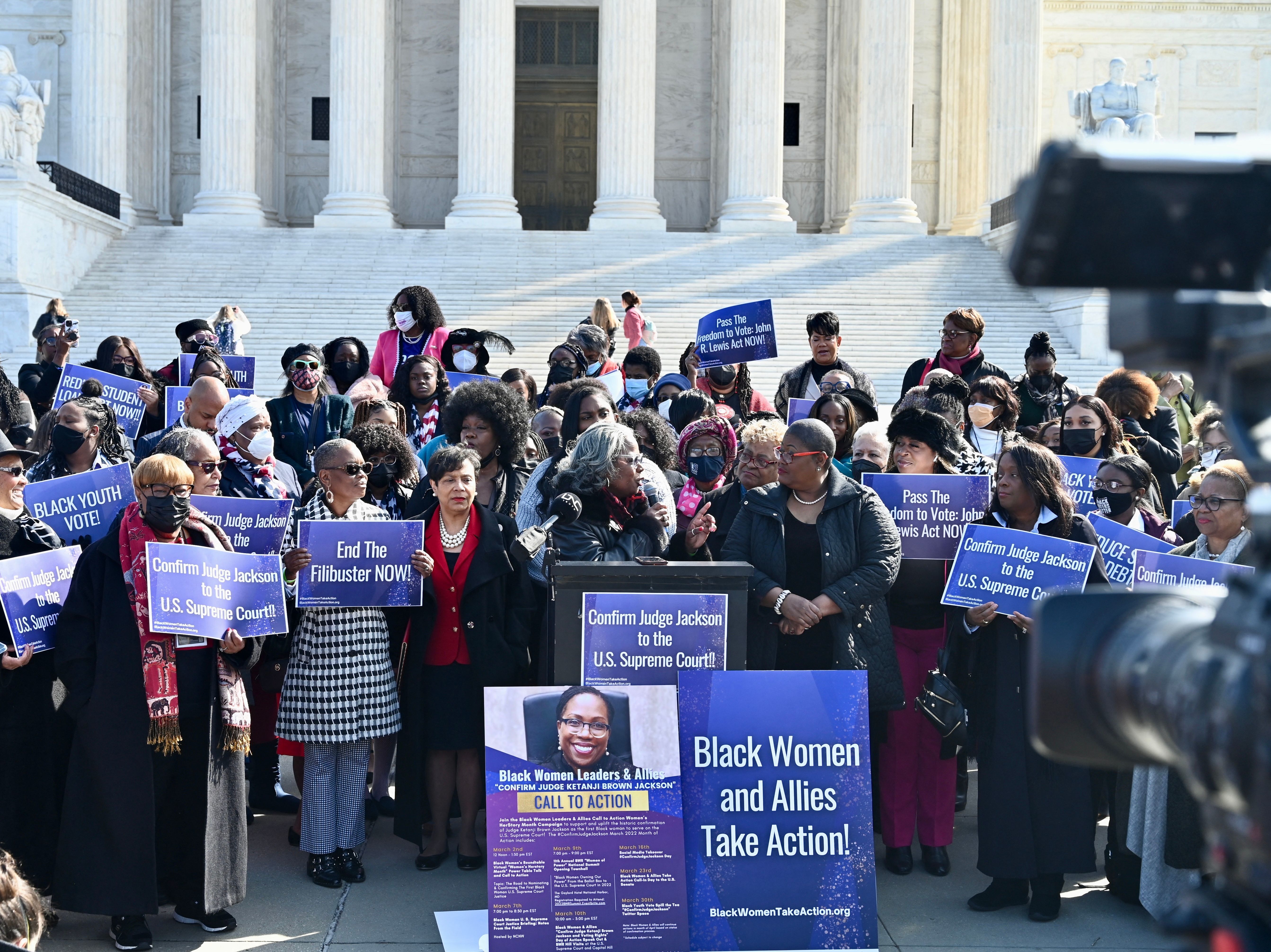 caption: Activists hold a news conference in front of the U.S. Supreme Court on March 10 asking for the confirmation of Judge Ketanji Brown Jackson to the court.