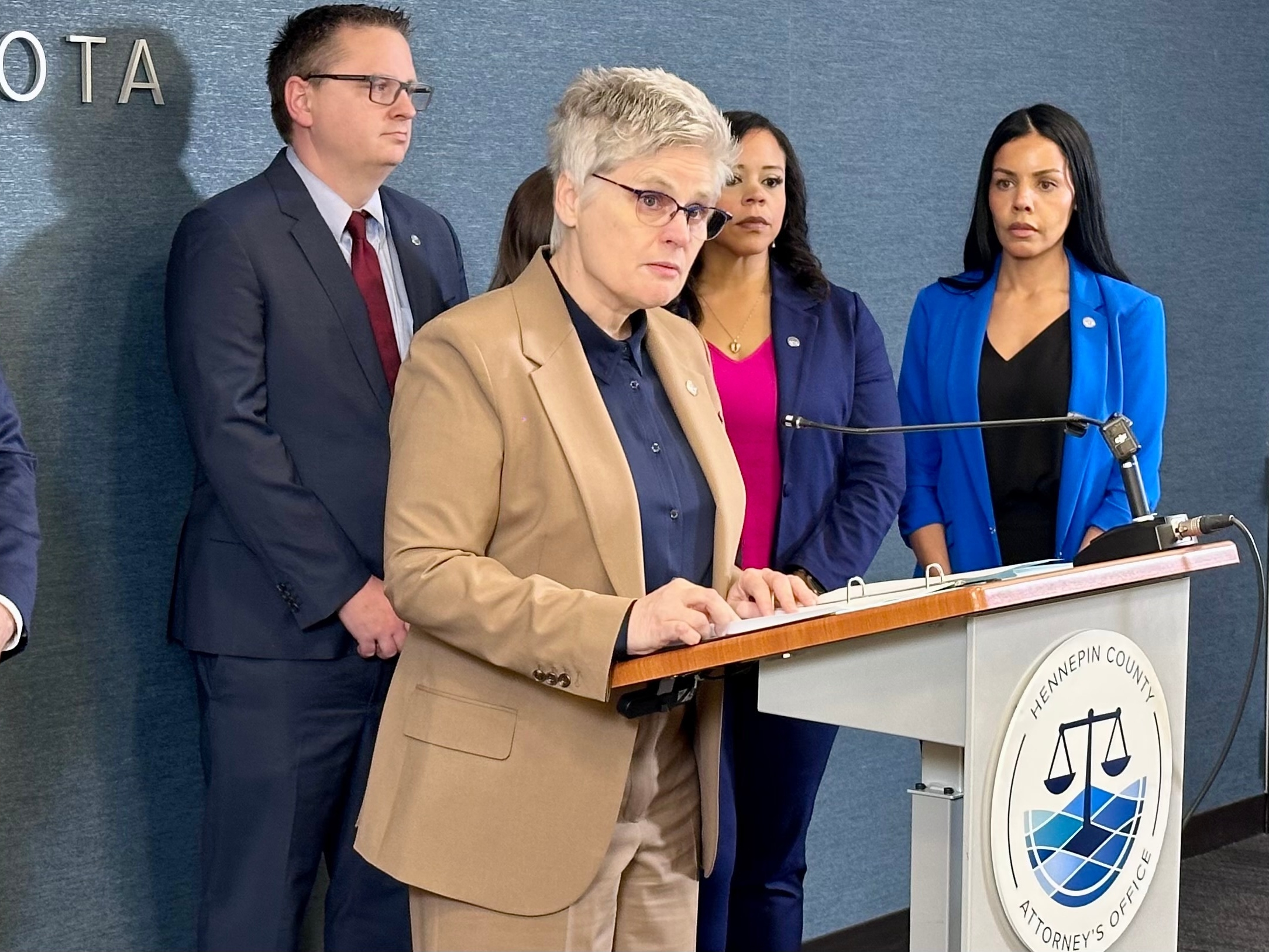 caption: Hennepin County Attorney Mary Moriarty announces charges against an Immigration and Customs Enforcement agent related to a February incident on April 16, 2026 in Minneapolis, Minn.